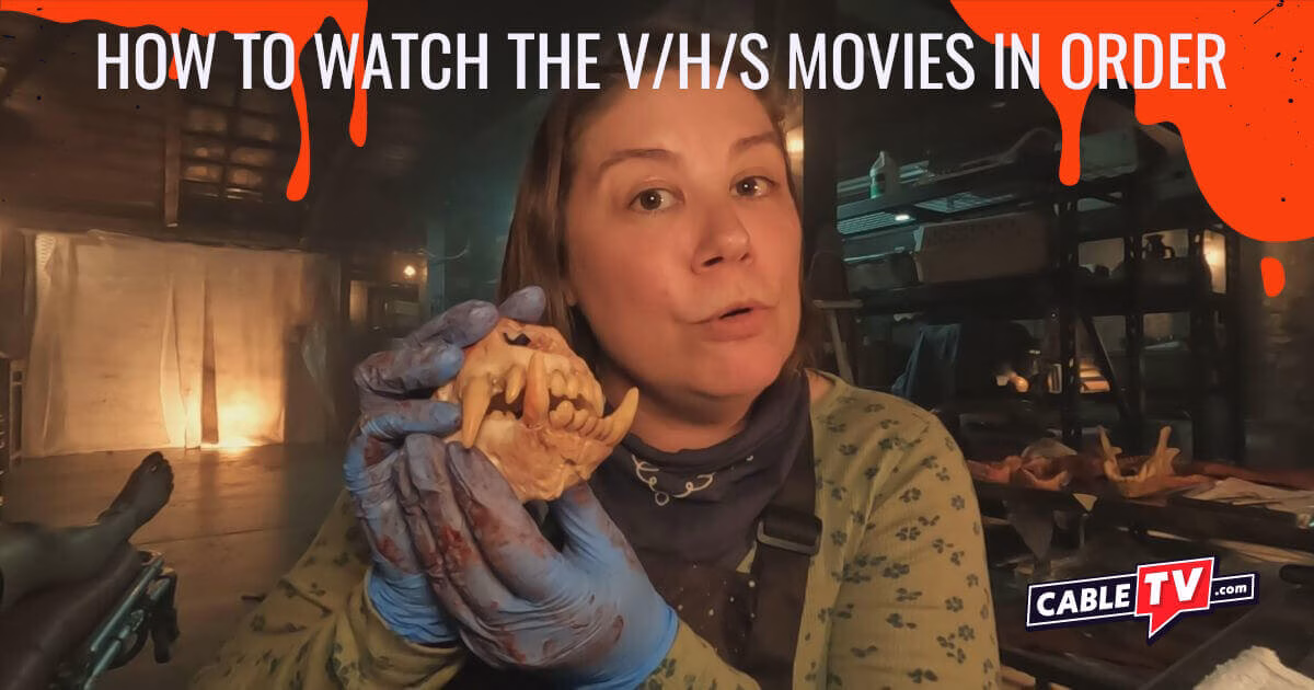 A woman wearing bloody surgical gloves holds the jawbone of a dog while talking to a camera in "Fur Babies" from V/H/S/Beyond. Photo courtesy of Shudder.