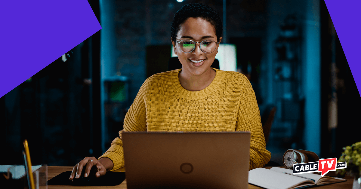 A woman on a laptop browsing the internet