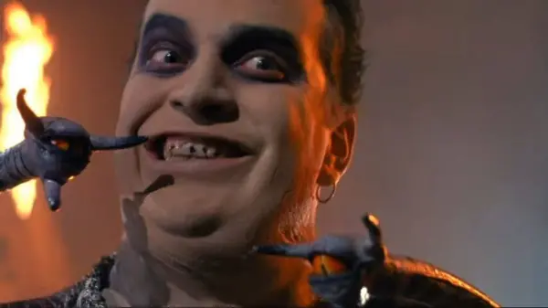 A demon leers at someone off-screen in a scene from Clive Barker's Nightbreed, one of several free horror movies to stream right now.