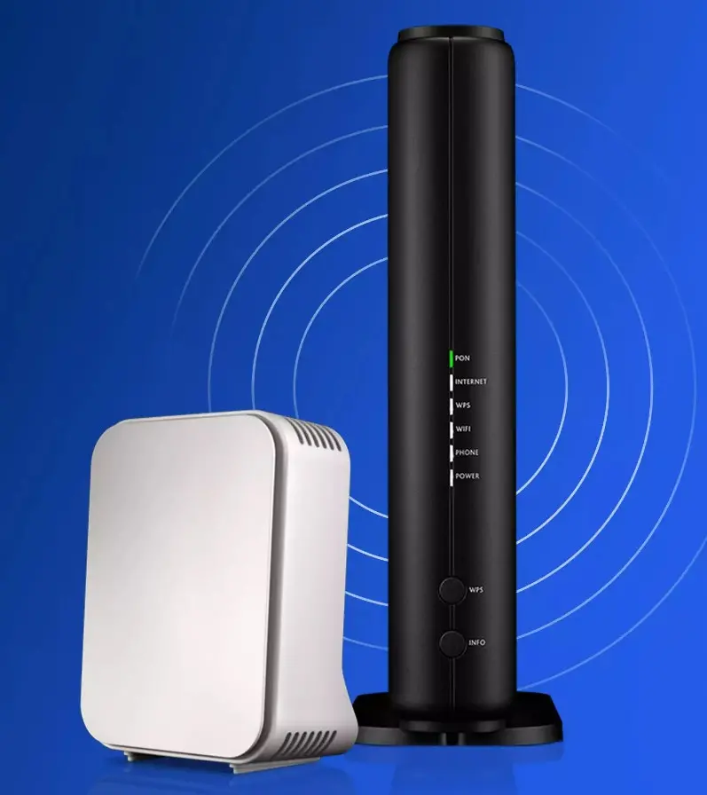 A square, white box next to a tall black device.